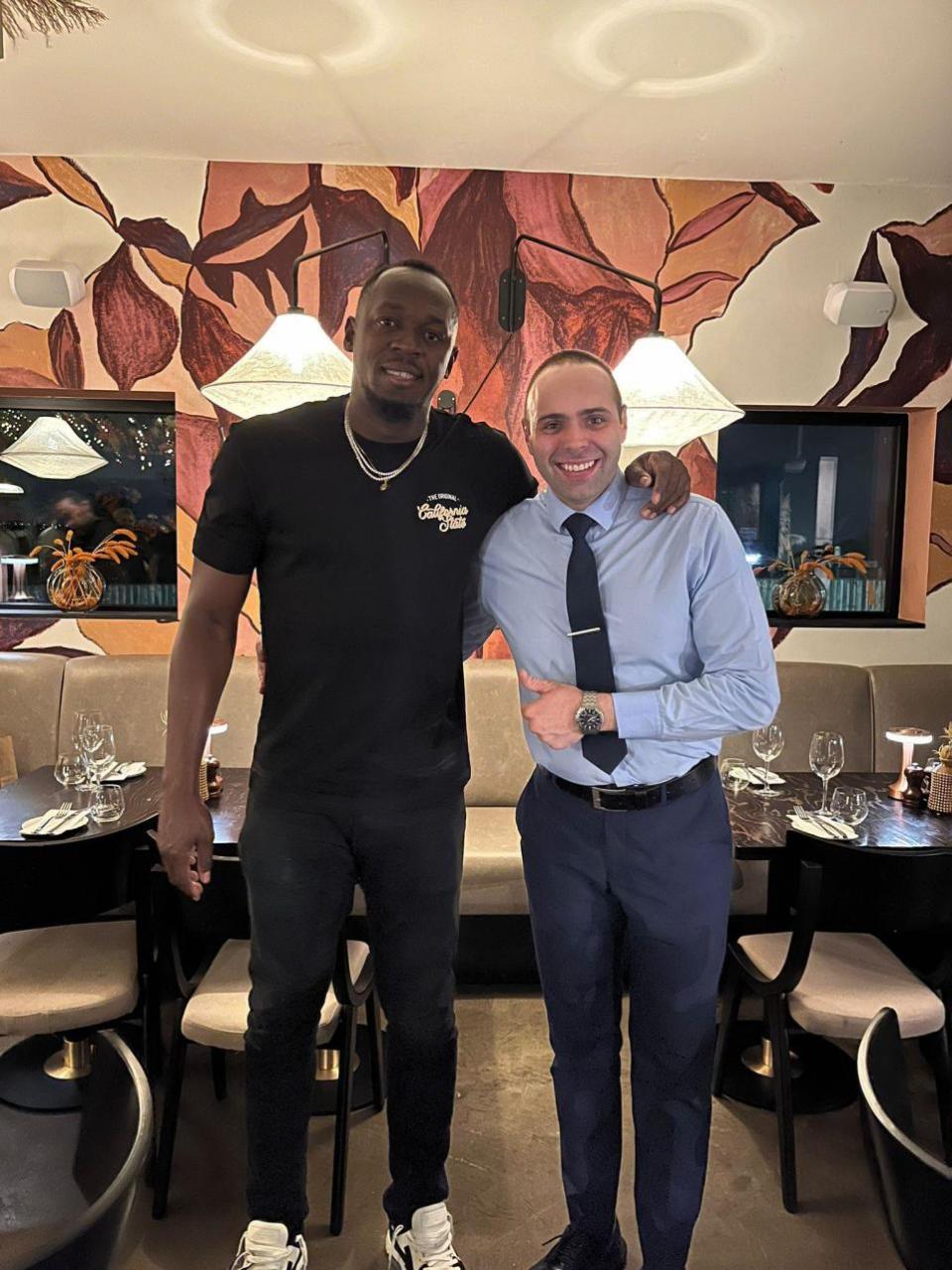 The Bolton News: Usain Bolton with Ewe's Dorin Apetrei, general manager