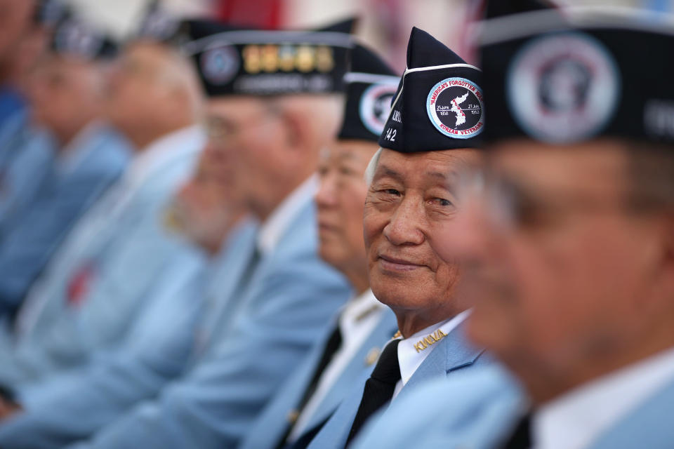 Veterans of the Korean War attend the commemoration of the 59th anniversary of the Korean War Armistice at Arlington National Cemetery July 27, 2012 in Arlington, Virginia. Hundreds of Korean war veterans attended the commemoration of the armistice agreement that ended more than three years of fighting between the United Nations, the People's Republic of China, North Korea and South Korea. (Photo by Chip Somodevilla/Getty Images)