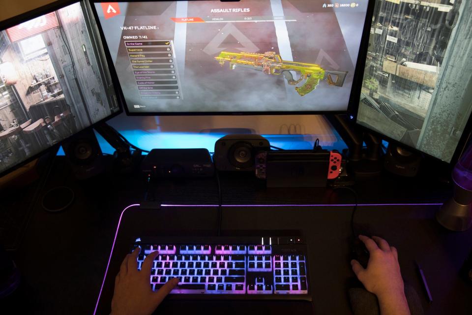 A gamer plays Electronic Arts' "Apex Legends" in Jersey City, N.J. in March 2019. Hate and harassment are rampant in online gaming, according to the Anti-Defamation League. Experts say the mental health effects can be detrimental to youth of color.