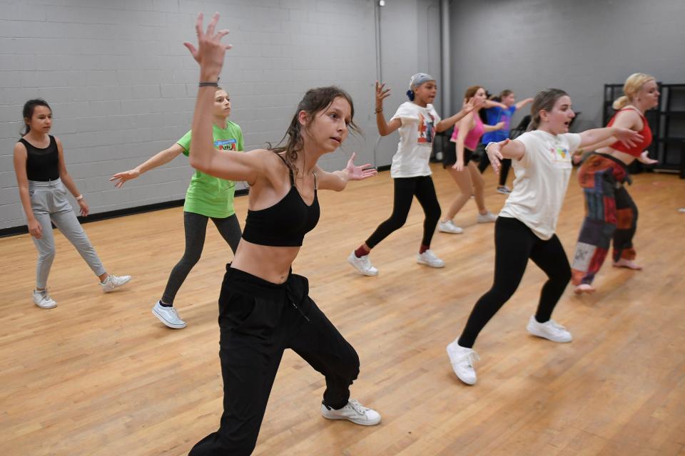 Students of the Riverside Dance Festival, a partnership between Ballet Vero Beach and Riverside Theatre, practice power moves and learn about hip-hop culture with Chicago Dance Crash, a professional company based in Chicago who fuses hip-hop and contemporary dance on Wednesday, Aug. 3, 2022. Students enrolled in the summer camp experience day-to-day life with Chicago Dance Crash, while taking technique classes in ballet and contemporary dance forms. The students, ages 10 and up, will perform a creation of their own work alongside their teachers in a concert to showcase the festival Saturday, Aug. 6, 2022 at 2 p.m. followed by Chicago Dance Crash's preview to their upcoming 20th anniversary of "Boomsday" at 7:30 p.m. Aug. 5 and 6.