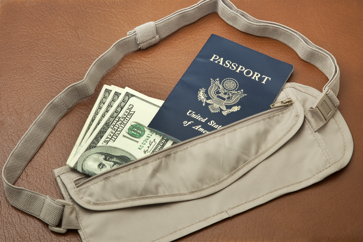 Money belt with U.S. money and passport