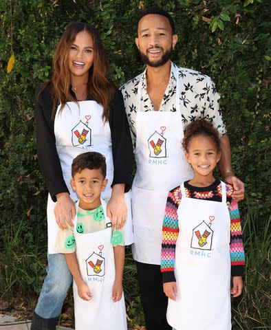 <p>Jerritt Clark/Getty Images for RMHC</p> Chrissy Teigen, John Legend, son Miles and daughter Luna