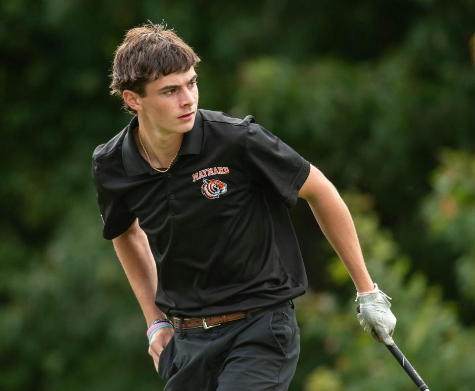 Maynard High School senior Will Fowler watches his drive on the first hole at the Maynard Golf Course Thursday.