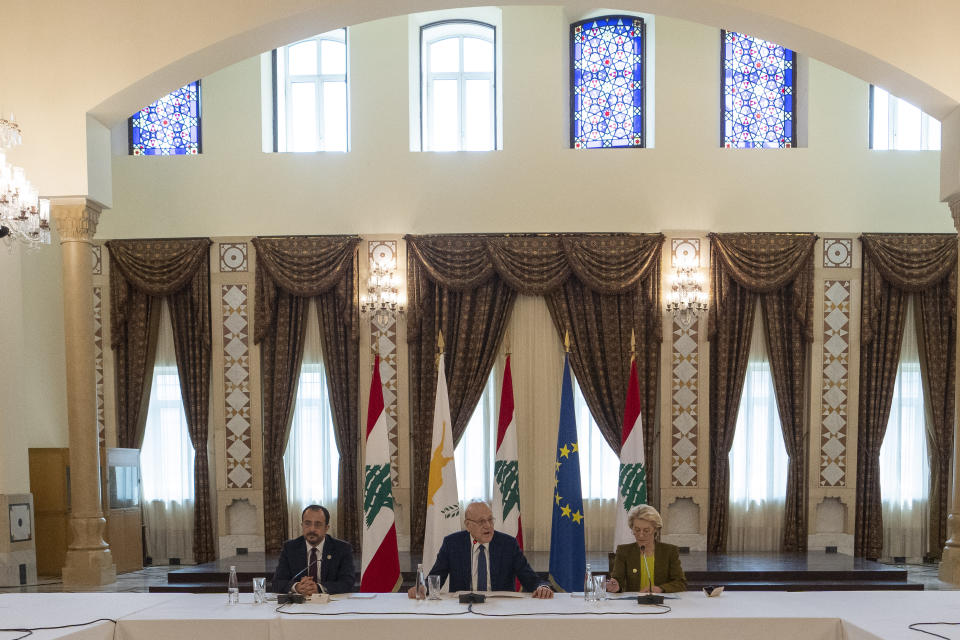 Lebanese caretaker Prime Minister Najib Mikati, center, speaks during his meeting with Cyprus' President Nikos Christodoulides, left, and President of the European Commission Ursula von der Leyen at the government palace in Beirut, Lebanon, Thursday, May 2, 2024. (AP Photo/Hassan Ammar)