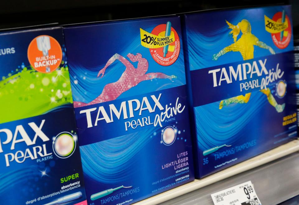 Boxes of tampons are displayed in a pharmacy, Monday, March 7, 2016, in New York. (AP Photo/Mark Lennihan)