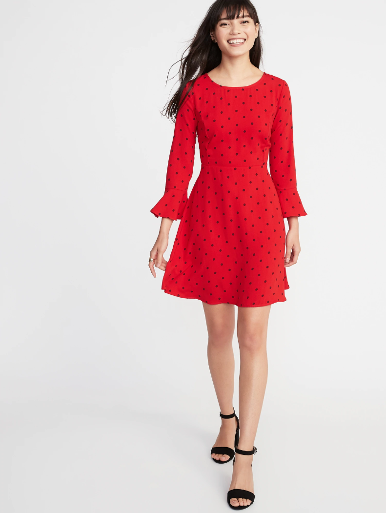 <p>A bright and sweet polka-dot red dress. We especially love the flirty flared cuffs. <br><a rel="noopener" href="https://fave.co/2QUq79U" target="_blank" data-ylk="slk:Shop it:;elm:context_link;itc:0;sec:content-canvas" class="link "><strong>Shop it:</strong></a> $17 (was $35), <a rel="noopener" href="https://fave.co/2QUq79U" target="_blank" data-ylk="slk:oldnavy.com;elm:context_link;itc:0;sec:content-canvas" class="link ">oldnavy.com</a> </p>