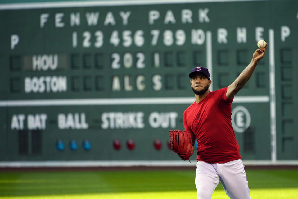 Boston Red Sox Game 3 starting pitcher Eduardo Rodríguez throws at a baseball practice at Fenway Park, Sunday, Oct. 17, 2021, in Boston. The Red Sox host the Houston Astros on Monday night. (AP Photo/Robert F. Bukaty)