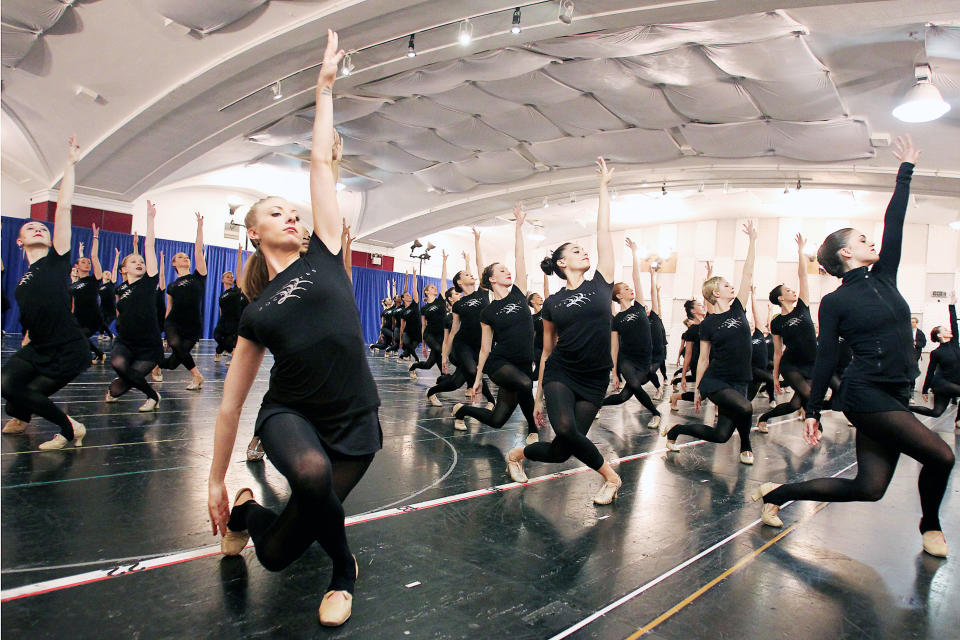 FILE - This Oct. 18, 2012 file image released by Starpix shows Rockettes dancers rehearsing for the Radio City Christmas Spectacular at the St. Paul the Apostle Church in New York. The Radio City Christmas Spectacular will celebrate its 85th anniversary of the Rockettes this year. The show opens Nov. 9 through Dec. 30. (AP Photo/Starpix, Dave Allocca, file)