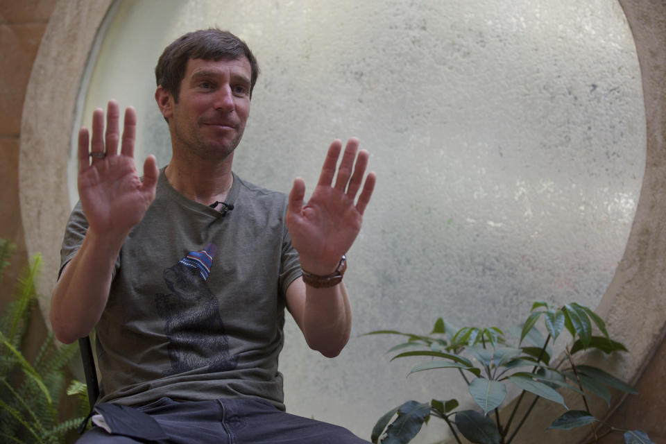 Mountain guide Lukas Furtenbach speaks to The Associated Press in Kathmandu, Nepal, Saturday, May 22, 2021. Furtenbach, an expert climbing guide said Saturday that a coronavirus outbreak on Mount Everest has infected at least 100 climbers and support staff, giving the first comprehensive estimate amid official Nepalese denials of a COVID-19 cluster on the world’s highest peak. (AP Photo/Bikram Rai)