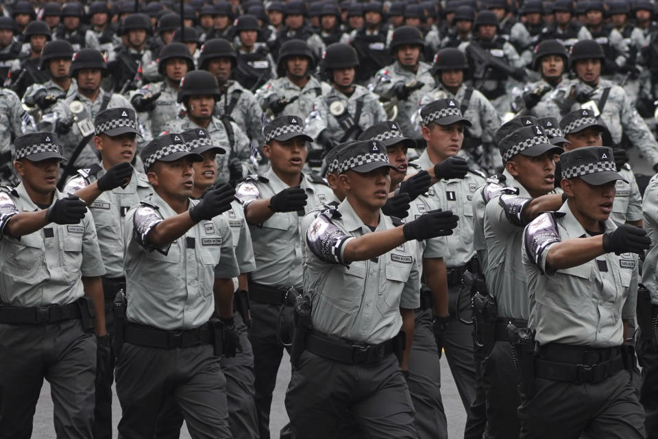 National Guards march in the anual Independence Day military parade in the capital's main square, the Zocalo, in Mexico City, on Friday, September 16, 2022. (AP Photo/Marco Ugarte)