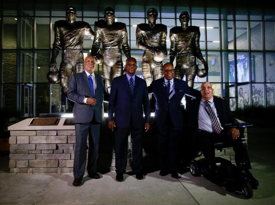 In 2016, the University of Kentucky unveiled statues honoring the four football players who broke the SEC color barrier from left: Mel Page, representing his late brother Greg Page; Nate Northington; Wilbur Hackett and Houston Hogg.