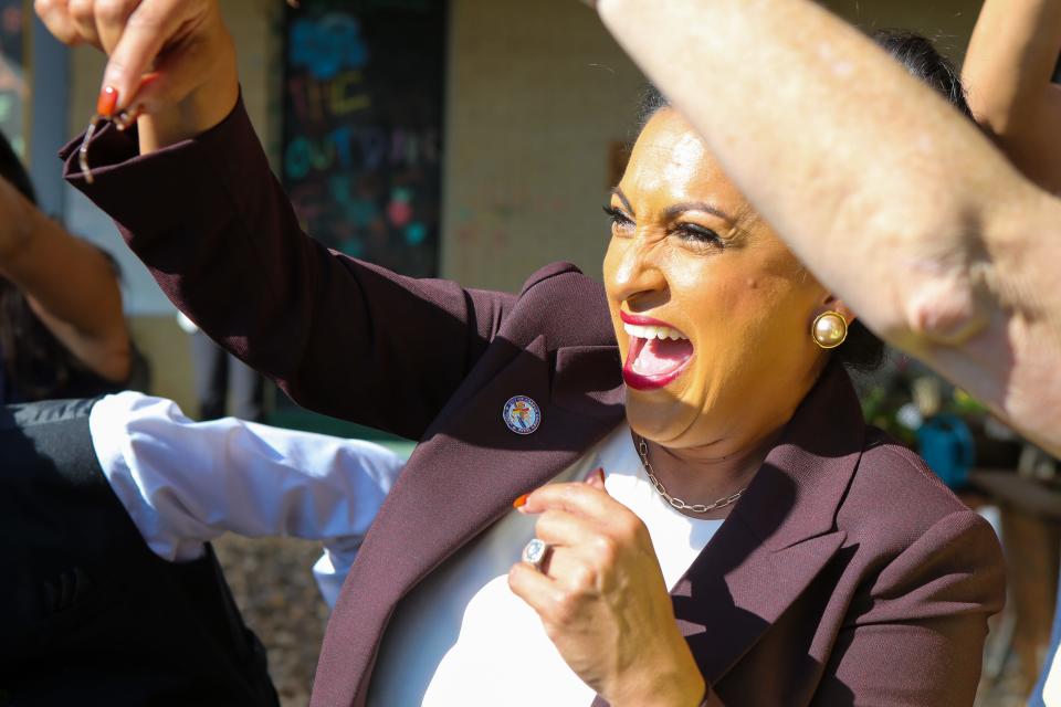 Corpus Christi Mayor Paulette Guajardo holds up a red wiggler worm at the Corpus Christi Montessori School Friday, Nov. 12, 2021.