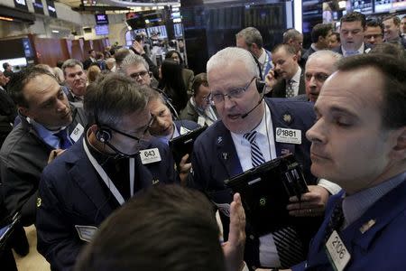 Traders work on the floor of the New York Stock Exchange (NYSE) April 15, 2016. REUTERS/Brendan McDermid