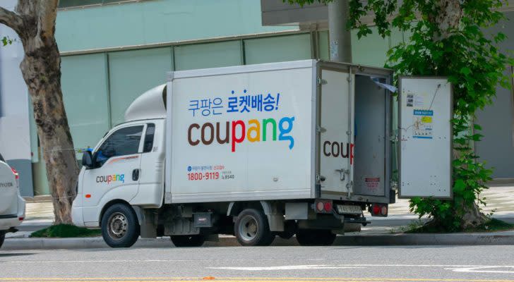 A close-up shot of a Coupang (CPNG) delivery vehicle.