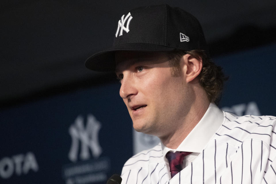 Gerrit Cole is introduced as the newest New York Yankees player during a baseball media availability, Wednesday, Dec. 18, 2019 in New York. The pitcher agreed to a 9-year $324 million contract. (AP Photo/Mark Lennihan)