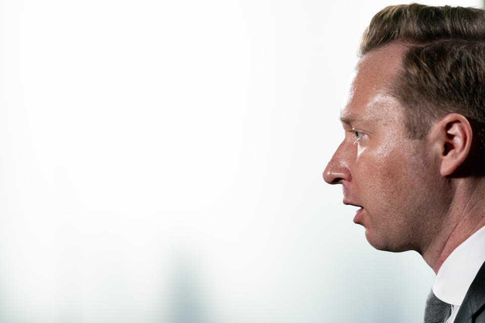 Andrew Adams, director of the Justice Department's KleptoCapture task force, designed to enforce the economic restrictions imposed on Russia and its billionaires, speaks to the Associated Press in an interview at the AP bureau in Washington, Wednesday, March 1, 2023. (AP Photo/Andrew Harnik)