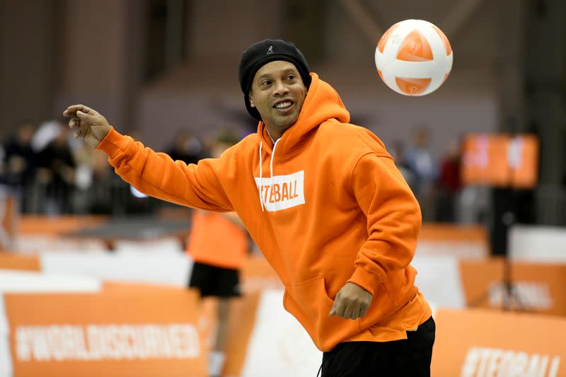 FILE PHOTO: Former FIFA player of the year and football World Cup winner Ronaldinho of Brazil plays Teqball at the Teqball World Championships in Budapest