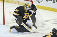 Boston Bruins goaltender Linus Ullmark (35) catches a shot during the third period of an NHL hockey game against the Buffalo Sabres, Friday, Oct. 22, 2021, in Buffalo, N.Y. (AP Photo/Joshua Bessex)