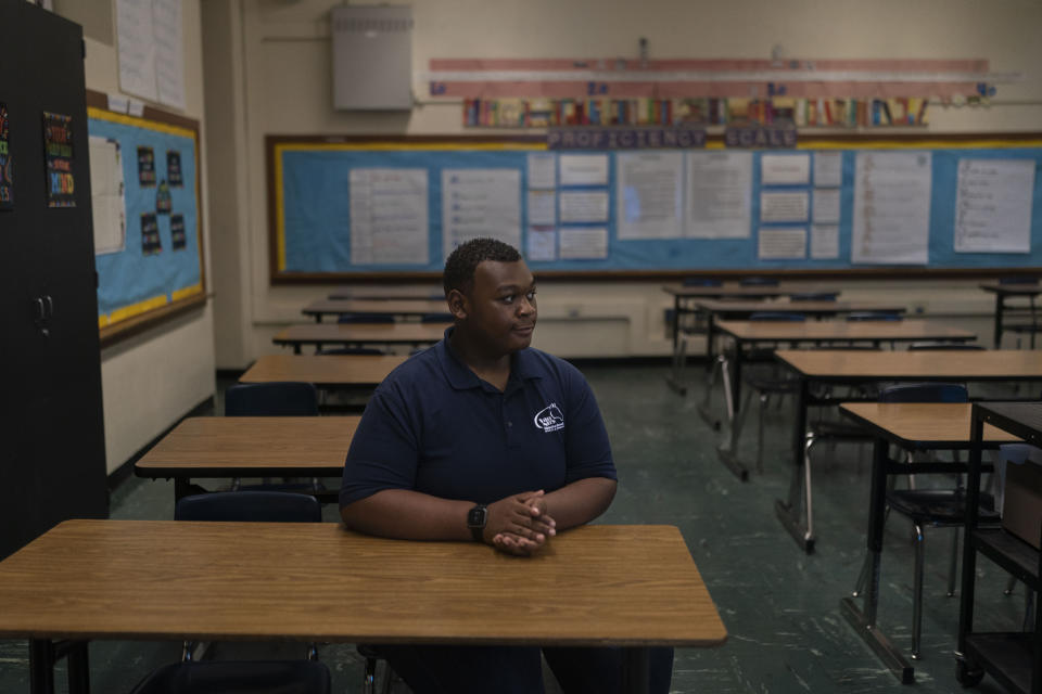 John Simon, a teenager who had a bariatric surgery in 2022, sits for a photo in his classroom at Van Nuys Middle School in Los Angeles, Monday, March 13, 2023. (AP Photo/Jae C. Hong)