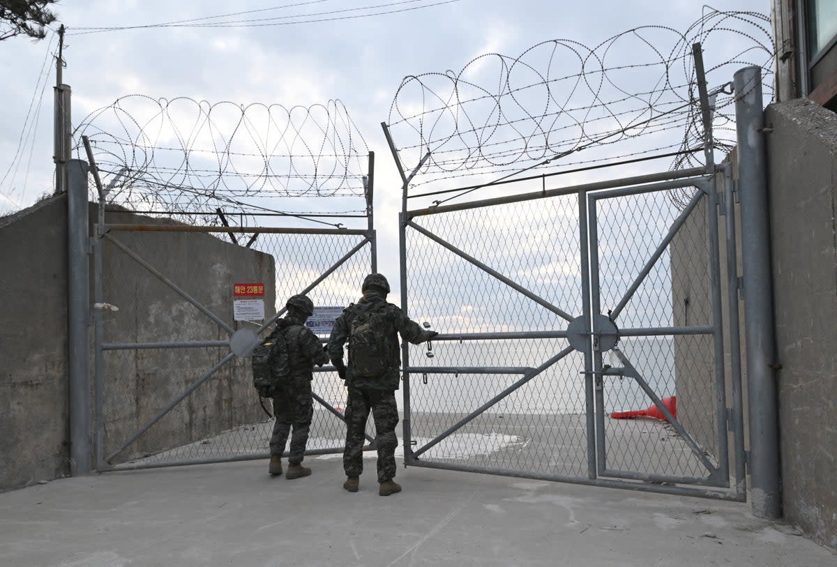 South Korean marines lock the entrance to a beach on Yeonpyeong island, near the 'northern limit line' sea boundary with North Korea (Getty Images/ Representative image)