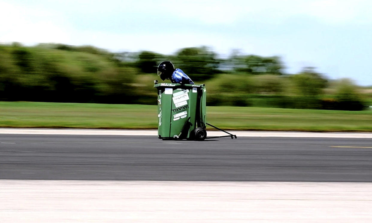 Andy Jennings who set a new wheelie bin Guinness world speed record. (SWNS)

 

 