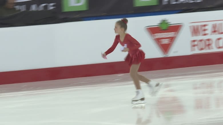 Young 'flower retrievers' thrilled to see their figure skating idols in Ottawa