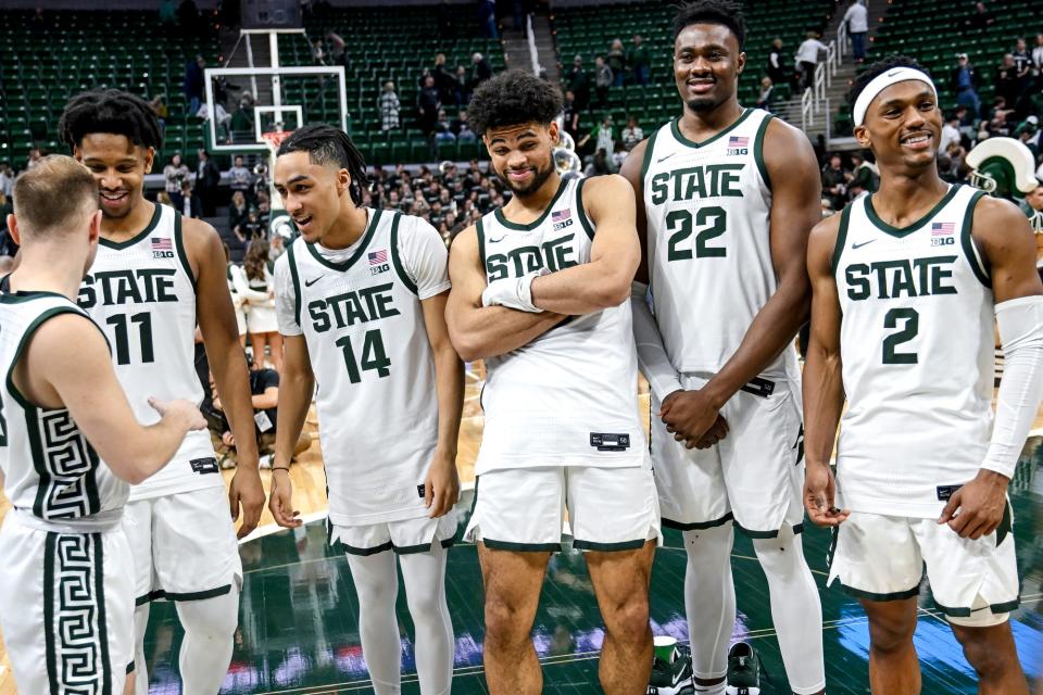 Michigan State seniors, from left, Steven Izzo, A.J. Hoggard, Davis Smith, Malik Hall, Mady Sissoko and Tyson Walker stand together during the senior night celebration after the game against Northwestern on Wednesday, March 6, 2024, at the Breslin Center in East Lansing.