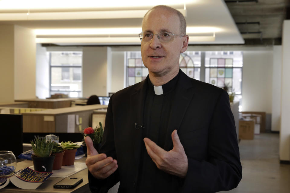 FILE - Father James Martin, a Jesuit priest and editor-at-large of America Magazine, is interviewed at the publication's offices, in New York, Monday, May 21, 2018. Martin, through his writings, public appearances and other activities, has been advocating over many years for greater LGBTQ inclusion in the church. He says critics of the October 2023 synod’s attention-getting agenda miss the essential purpose of the gathering at the Vatican. (AP Photo/Richard Drew, File)