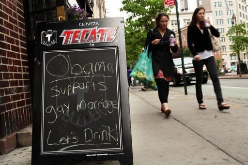 Patrons walk by the Stonewall Inn, a historic New York gay bar. US President Barack Obama has taken a calculated gamble and stepped into the political unknown with his firm public backing for gay marriage, after a long period of personal soul searching