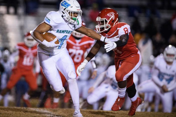 J.H. Rose running back Michael Allen carries the ball against Seventy-First in a third-round NCHSAA 3A playoff game on Nov. 19, 2021. Allen, a four-star 2022 recruit and N.C. State commit, is now two wins away from a football state championship.