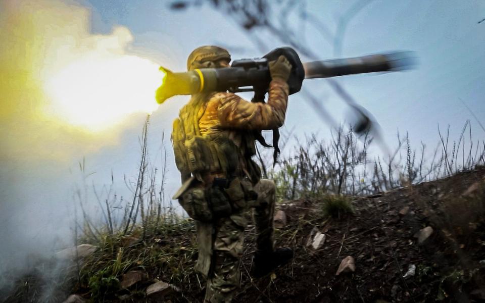 A Ukrainian soldier fires an anti-tank missile at an undisclosed location in the Donetsk region - AP Photo/Roman Chop