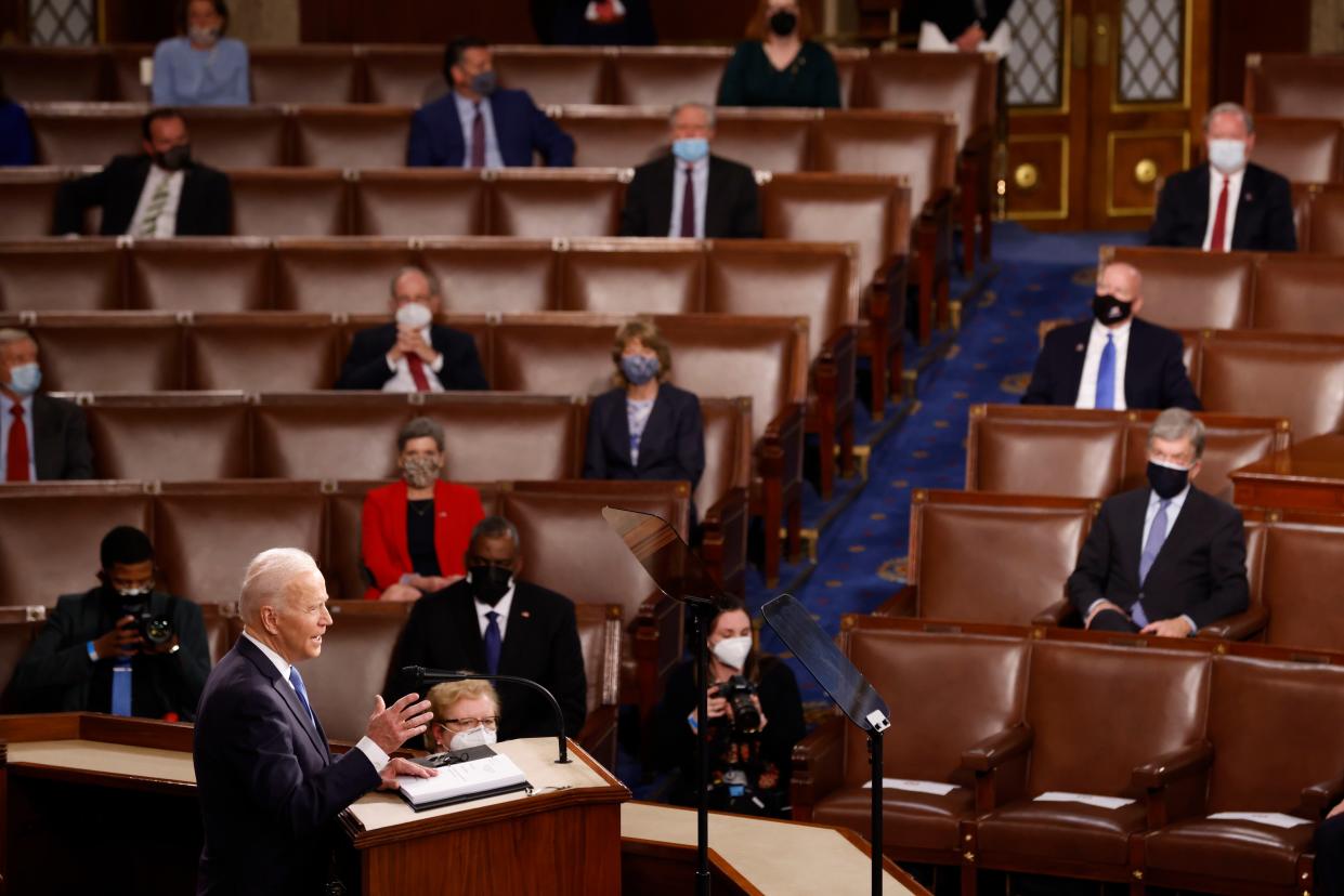 Republican members listen as President Joe Biden addresses a joint session of Congress, Wednesday, April 28, 2021, in the House Chamber at the U.S. Capitol in Washington.