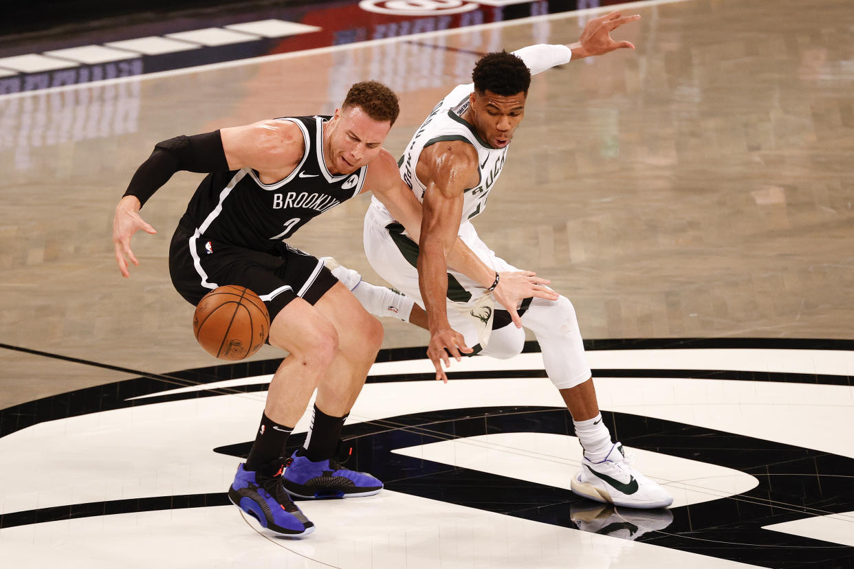 NEW YORK, NEW YORK - JUNE 05: Giannis Antetokounmpo #34 of the Milwaukee Bucks steals the ball from Blake Griffin #2 of the Brooklyn Nets during the first quarter during Game One of the Eastern Conference second round series at Barclays Center on June 05, 2021 in New York City. NOTE TO USER: User expressly acknowledges and agrees that, by downloading and or using this photograph, User is consenting to the terms and conditions of the Getty Images License Agreement. (Photo by Tim Nwachukwu/Getty Images)