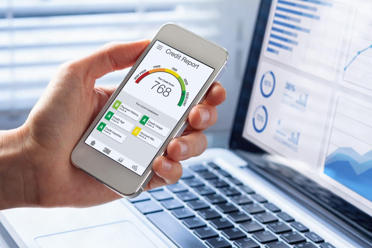 Credit Report with Score rating app on smartphone screen showing creditworthiness of a person