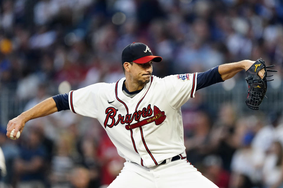 Atlanta Braves starting pitcher Charlie Morton (50) works in the second inning of a baseball game against the Philadelphia Phillies Tuesday, Sept. 28, 2021, in Atlanta. (AP Photo/John Bazemore)