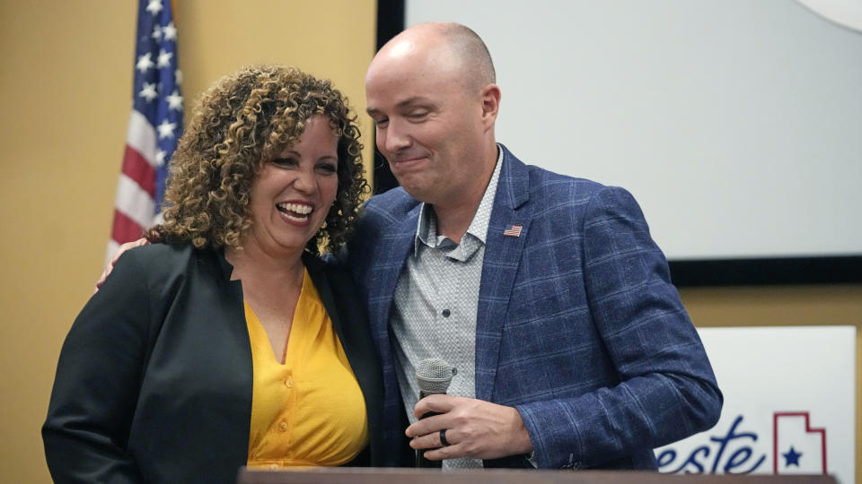 Utah Gov. Spencer Cox hugs Utah 2nd Congressional District Republican nominee Celeste Maloy during an election night party at the Utah Trucking Association Tuesday, Nov. 21, 2023, in West Valley City, Utah. (AP Photo/Rick Bowmer)