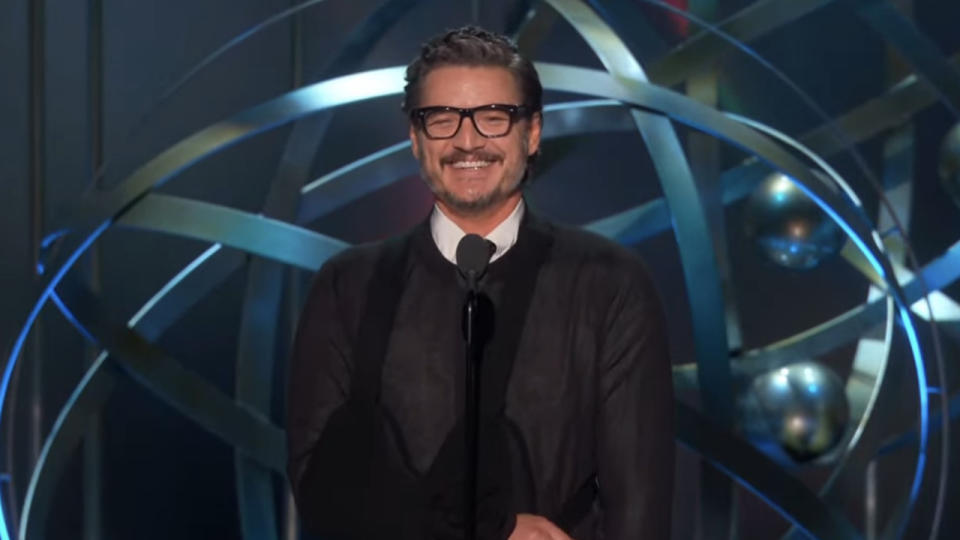 Pedro Pascal in arm brace presenting at 2023 Emmys