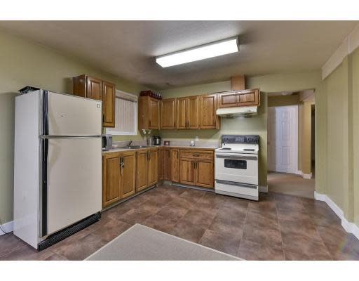 <p><span>2172 Fraser Ave., Port Coquitlam, B.C.</span><br>The rental suite has a full kitchen, bathroom, and lots of space.<br>(Photo courtesy Zoocasa) </p>