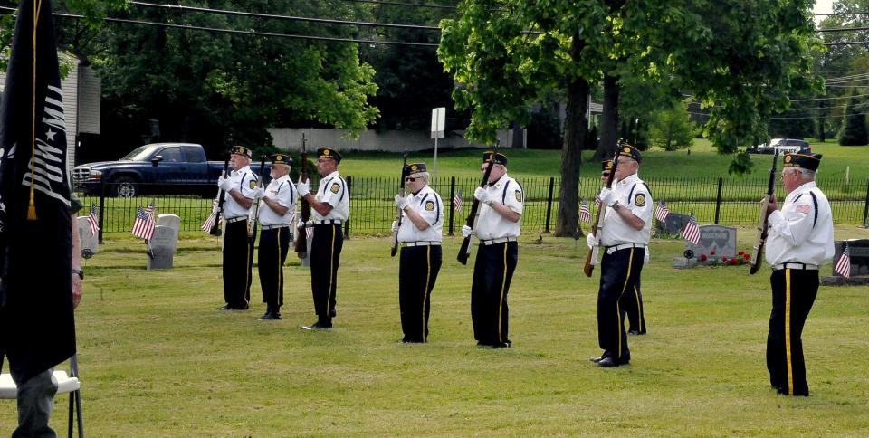 American Legion 
Post 68 presented the 21-gun salute at the Wooster Memorial Day service.