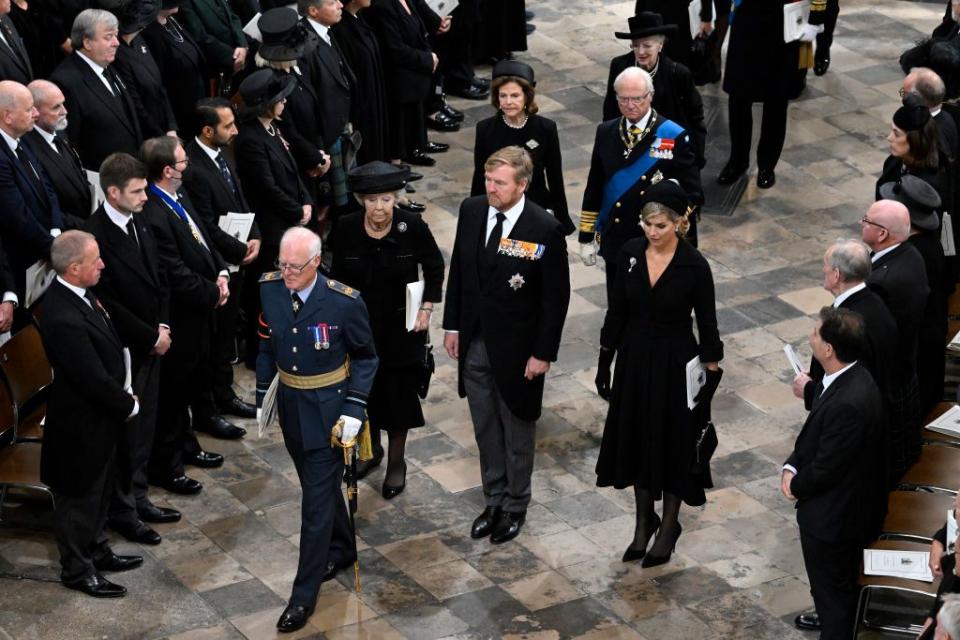 <p>King Carl XVI Gustaf (in the blue sash) and his wife Queen Silvia (next to him) attended the funeral of Queen Elizabeth in London.</p>