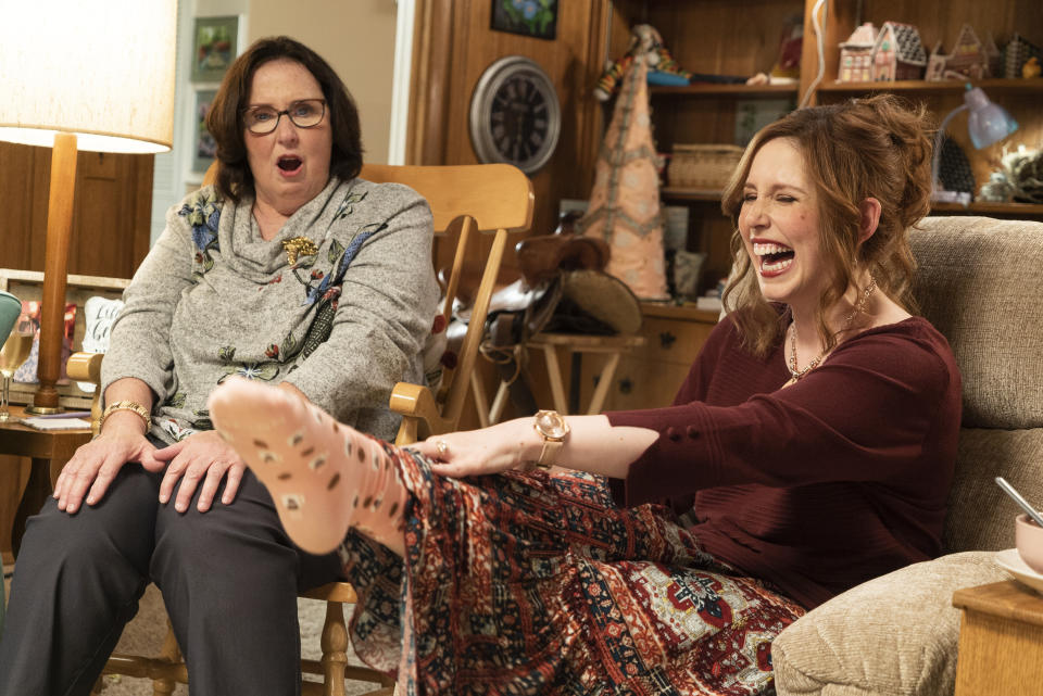 This image released by Lionsgate shows Phyllis Smith, left, and Vanessa Bayer in "Barb and Star Go to Vista Del Mar." (Richard Foreman/Lionsgate via AP)