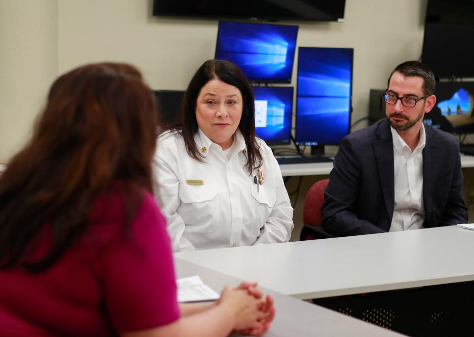 Rockford Fire Chief Michele Pankow and Mayor Tom McNamara speak with U.S. Sen. Tammy Duckworth, D-Illinois, on Saturday, Jan. 21, 2023, at Rockford Fire Department headquarters in Rockford.