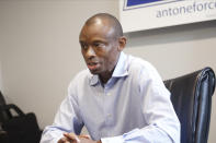 Fifth Congressional District candidate, Democrat Antone Melton-Meaux, answers questions during an interview in his Minneapolis office Wednesday, July 22, 2020. Melton-Meaux is giving Democrat Rep. Ilhan Omar an unexpectedly strong, well-funded primary challenge in one of the country's most heavily Democratic congressional districts, which includes Minneapolis and some suburbs. (AP Photo/Jim Mone)