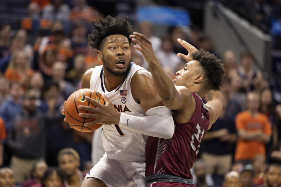 Virginia forward Jayden Gardner (1) drives with the ball against North Carolina Central during the first half of an NCAA college basketball game in Charlottesville, Va., Monday, Nov. 7, 2022. (AP Photo/Mike Kropf)