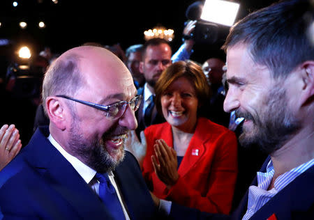 Germany's Social Democratic Party (SPD) candidate for chancellor Martin Schulz greets party members after the TV debate with his challenger German Chancellor Angela Merkel of the Christian Democratic Union (CDU) in Berlin, Germany, September 3, 2017. 24. German voters will take to the polls in a general election on September 24. REUTERS/Fabrizio Bensch