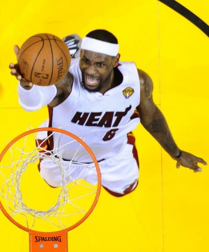 The Miami Heat's LeBron James goes to the hoop against Oklohoma City Thunder in the fifth game of the NBA Finals at the American Airlines Arena in Miami, Florida. Miami won the series 4-1