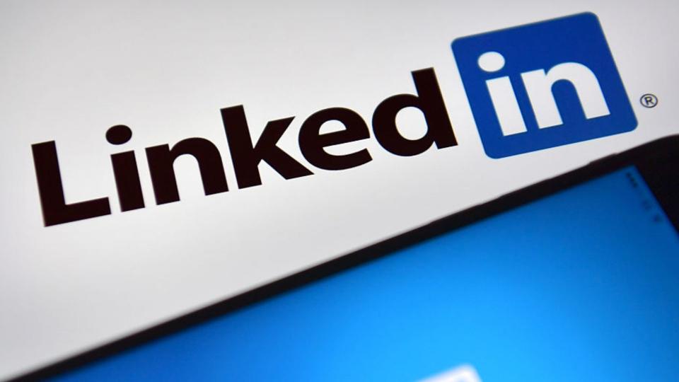 Female users are speaking out after receiving harassing messages from men on LinkedIn. (Image via Getty Images).