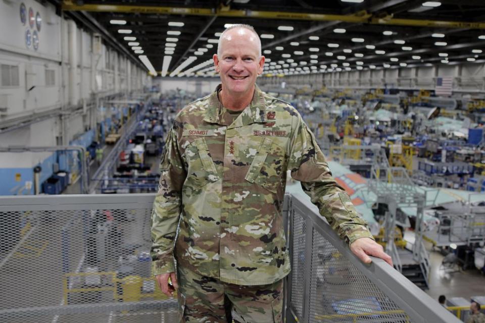 FORT WORTH, TEXAS (Nov. 03, 2022) – F-35 Joint Program Executive Officer (PEO) Lt. Gen. Michael Schmidt stands elevated above the production floor at Lockheed Martin’s Air Force Plant 4 in Fort Worth, Texas, Nov. 03, 2022, with the F-35 assembly line in the background. This was Schmidt’s first visit to the facility since having assumed the duties of F-35 PEO. The F-35 Joint Program Office is the Department of Defense's focal point for the 5th generation strike aircraft for the Navy, Air Force, Marines, and our allies. The F-35 is the premier multi-mission, 5th-generation weapon system. Its ability to collect, analyze and share data is a force multiplier that enhances all assets in the battle-space: with stealth technology, advanced sensors, weapons capacity, and range. The F-35, which has been operational since July 2015, is the most lethal, survivable, and interoperable fighter aircraft ever built. (U.S. Navy Photo by Chief Mass Communication Specialist Matthew Olay/Released)