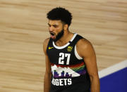 Jamal Murray of the Denver Nuggets reacts after a shot during the second half of Game 5 of an NBA basketball first-round playoff series, Tuesday, Aug. 25, 2020, in Lake Buena Vista, Fla. (Mike Ehrmann/Pool Photo via AP)