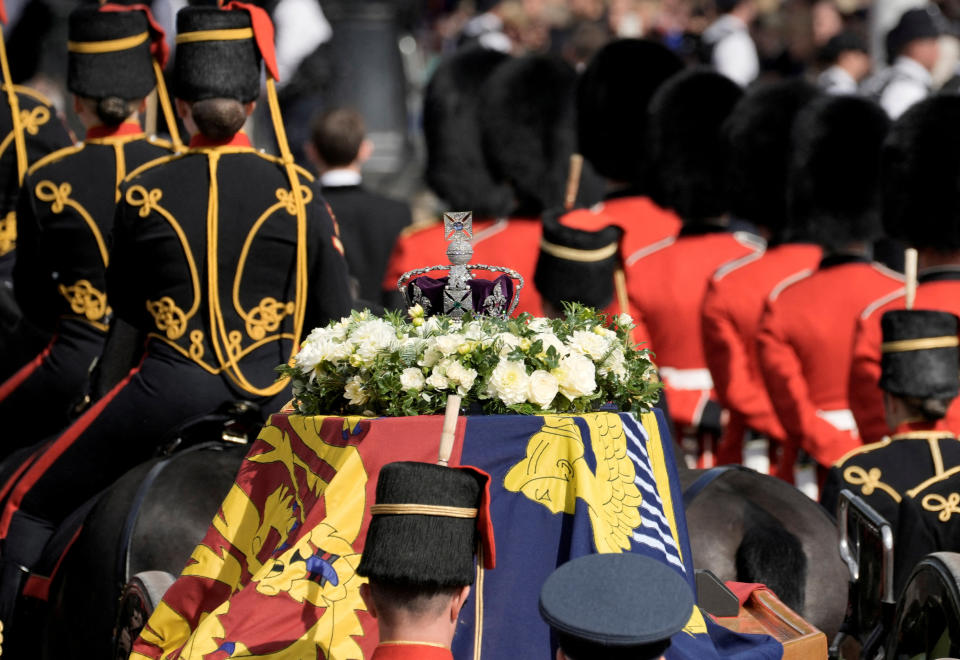 <p>The coffin of Queen Elizabeth II is transported from Buckingham Palace to Westminster Hall in London, Wednesday, Sept. 14, 2022.Vadim Ghirda/Pool via REUTERS TPX IMAGES OF THE DAY</p> 